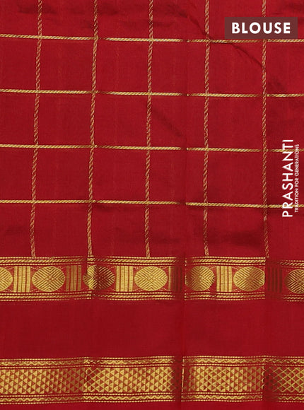 Silk cotton saree green and red with allover zari checked pattern and rettapet zari woven border