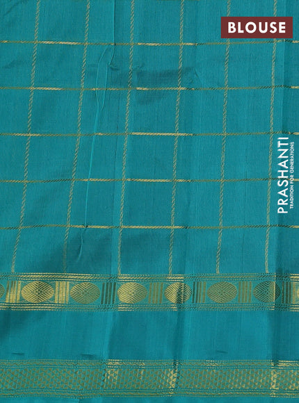 Silk cotton saree violet and teal blue with allover zari checked pattern and rettapet zari woven border