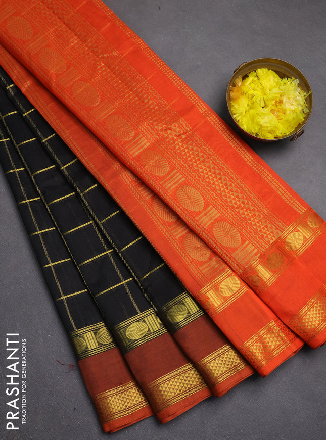 Silk cotton saree black and orange with allover zari checked pattern and rettapet zari woven border