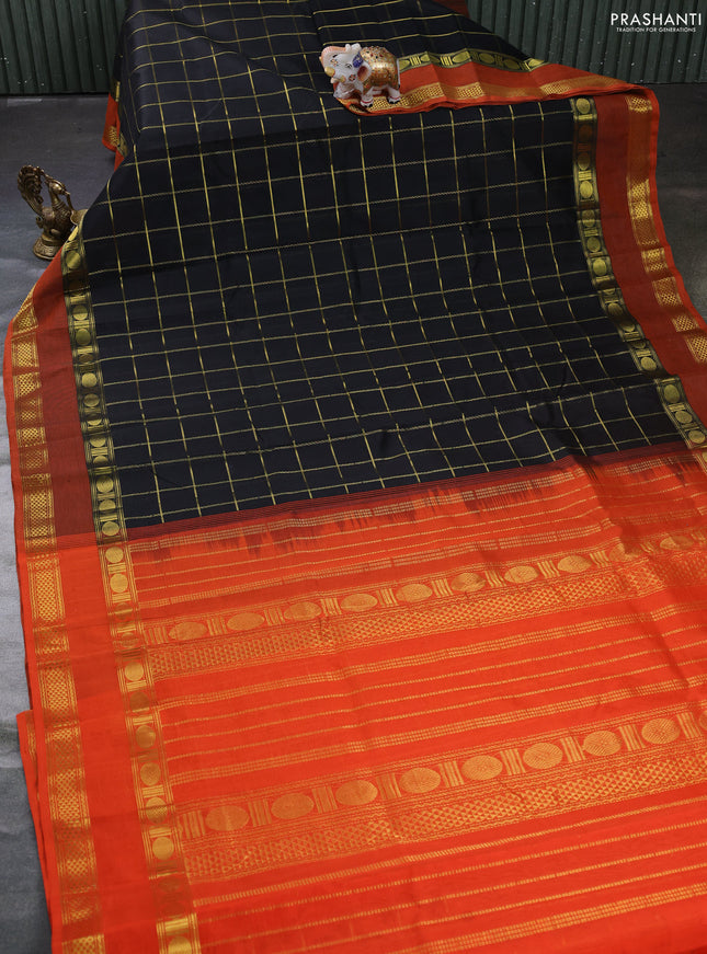 Silk cotton saree black and orange with allover zari checked pattern and rettapet zari woven border