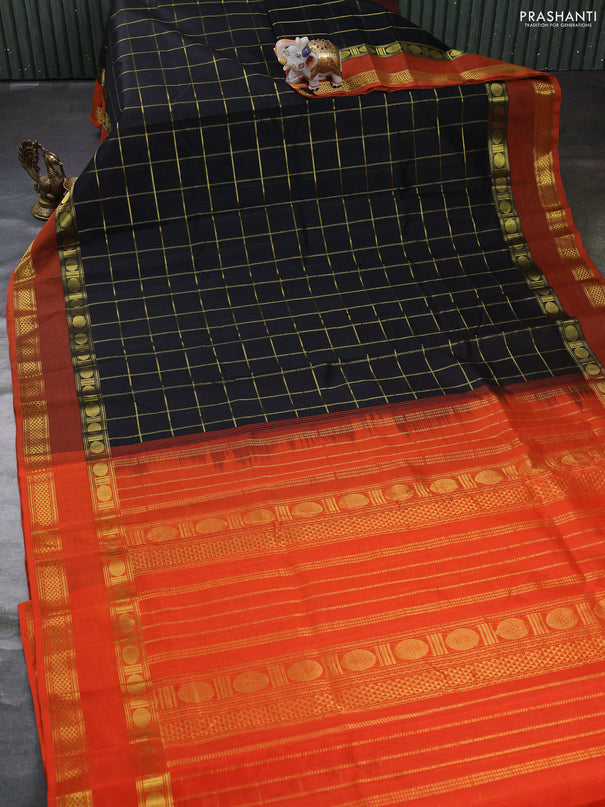Silk cotton saree black and orange with allover zari checked pattern and rettapet zari woven border