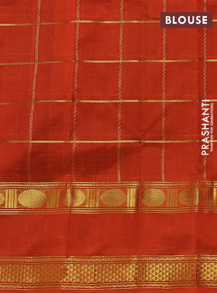 Silk cotton saree black and orange with allover zari checked pattern and rettapet zari woven border