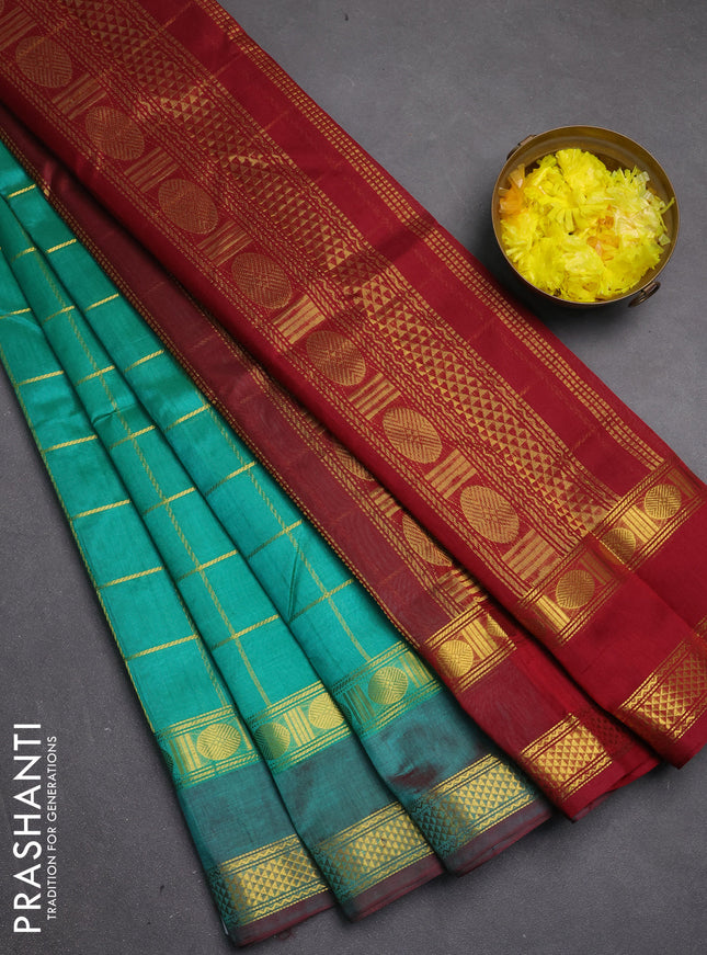 Silk cotton saree teal green and maroon with allover zari checked pattern and rettapet zari woven border