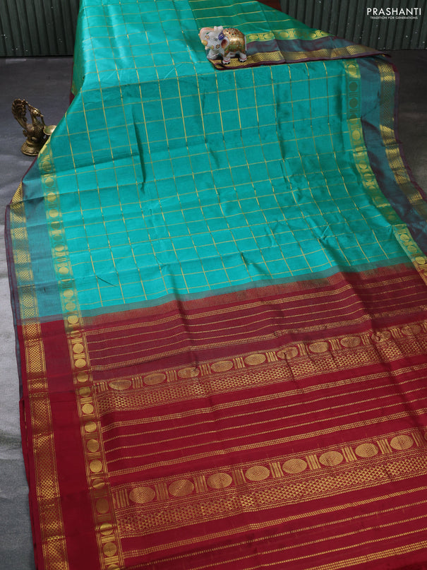 Silk cotton saree teal green and maroon with allover zari checked pattern and rettapet zari woven border