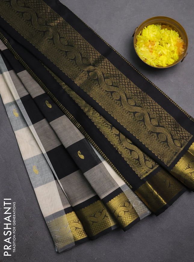 Silk cotton saree cream and black with allover paalum pazhamum checks & zari buttas and zari woven border