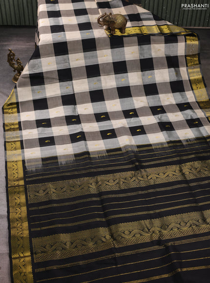 Silk cotton saree cream and black with allover paalum pazhamum checks & zari buttas and zari woven border