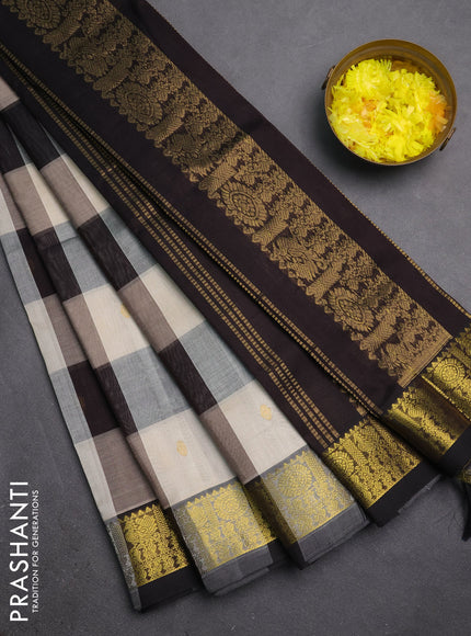 Silk cotton saree cream and black with allover paalum pazhamum checks & zari buttas and zari woven border