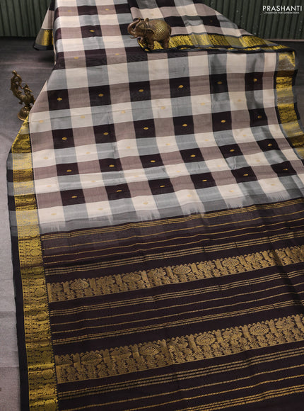 Silk cotton saree cream and black with allover paalum pazhamum checks & zari buttas and zari woven border