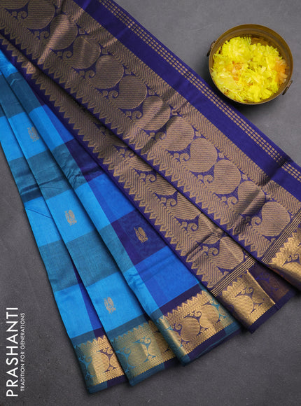 Silk cotton saree cs blue and blue with allover paalum pazhamum checks & zari buttas and paisley zari woven border