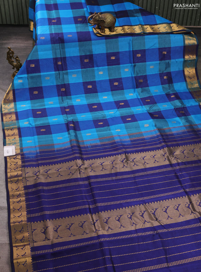 Silk cotton saree cs blue and blue with allover paalum pazhamum checks & zari buttas and paisley zari woven border