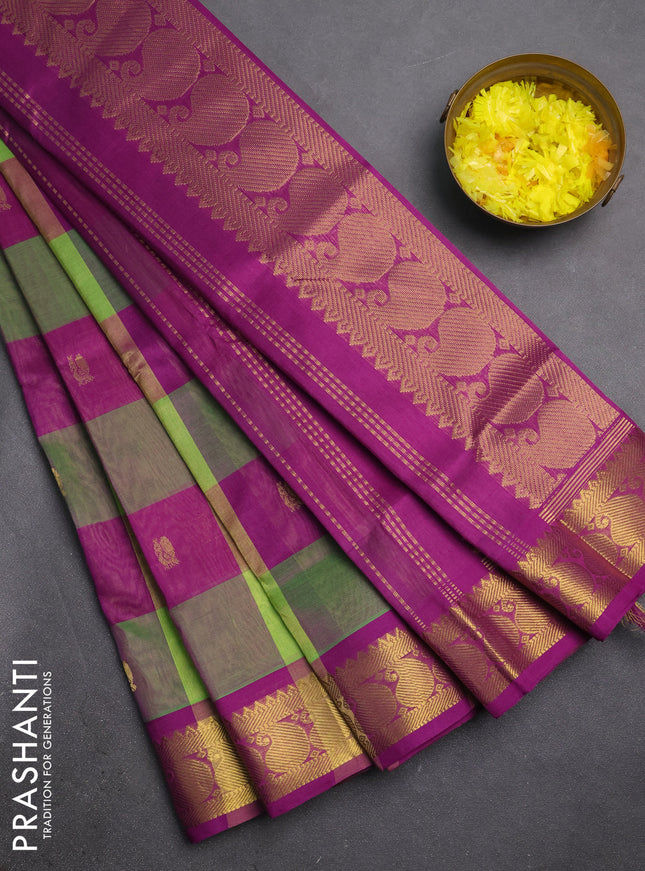 Silk cotton saree green and purple with allover paalum pazhamum checks & zari buttas and paisley zari woven border