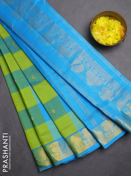 Silk cotton saree light green and light blue with allover paalum pazhamum checks & zari buttas and zari woven border