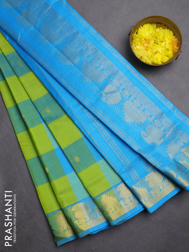 Silk cotton saree light green and light blue with allover paalum pazhamum checks & zari buttas and zari woven border