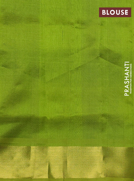 Silk cotton saree dark blue and light green with allover paalum pazhamum checks & zari buttas and zari woven border