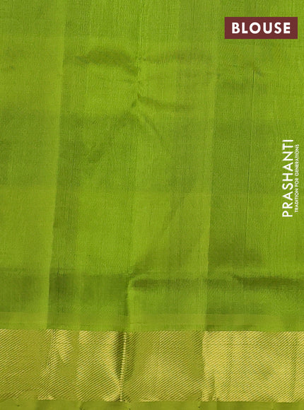 Silk cotton saree black and light green with allover paalum pazhamum checks & zari buttas and zari woven border