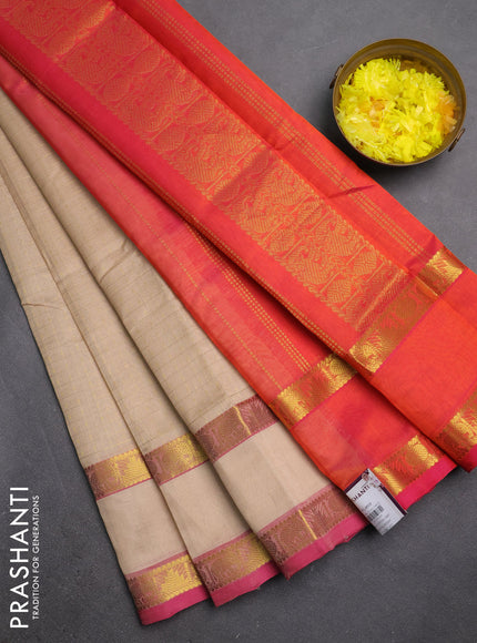 Silk cotton saree beige and dual shade of pinkish orange with allover lakshadeepam weaves and rettapet zari woven border