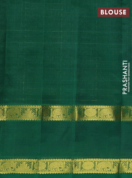 Silk cotton saree purple and green with allover lakshadeepam weaves and rettapet zari woven border