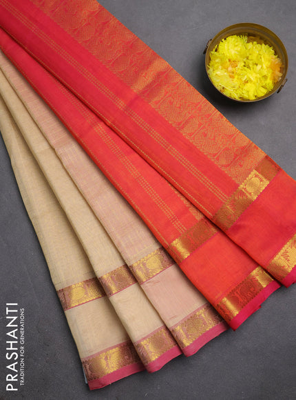 Silk cotton saree sandal and dual shade of pinkish orange with allover lakshadeepam weaves and rettapet zari woven border