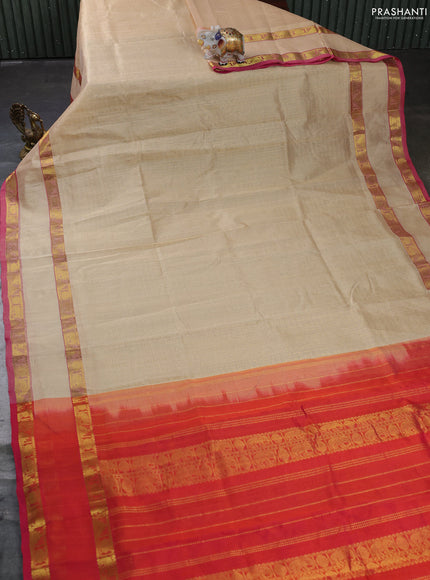Silk cotton saree sandal and dual shade of pinkish orange with allover lakshadeepam weaves and rettapet zari woven border