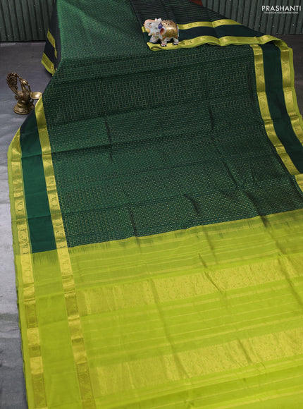 Silk cotton saree bottle green and light green with allover lakshadeepam weaves and rettapet zari woven border