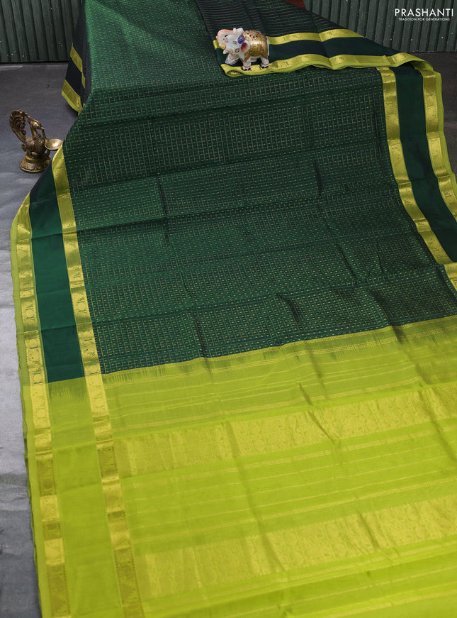 Silk cotton saree bottle green and light green with allover lakshadeepam weaves and rettapet zari woven border