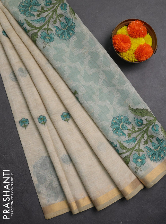 Jamdhani cotton saree cream and teal green with allover self emboss thread woven buttas and jamdhani pallu