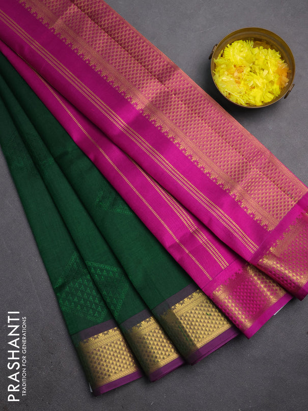 Silk cotton saree bottle green and purple with allover self emboss jacquard and zari woven border