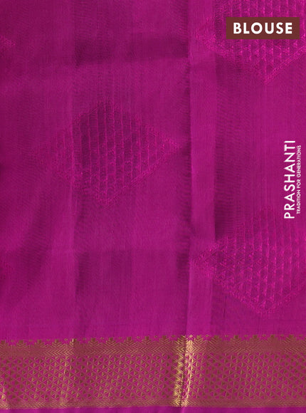 Silk cotton saree bottle green and purple with allover self emboss jacquard and zari woven border