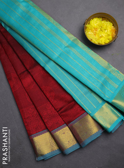 Silk cotton saree maroon and teal blue with allover self emboss jacquard and annam zari woven border