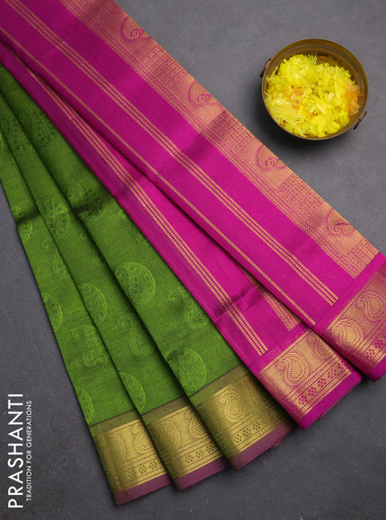 Silk cotton saree mehendi green and magenta pink with allover self emboss jacquard and paisley zari woven border