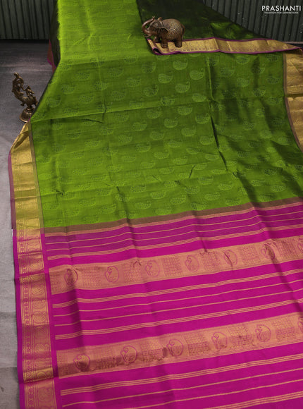 Silk cotton saree mehendi green and magenta pink with allover self emboss jacquard and paisley zari woven border