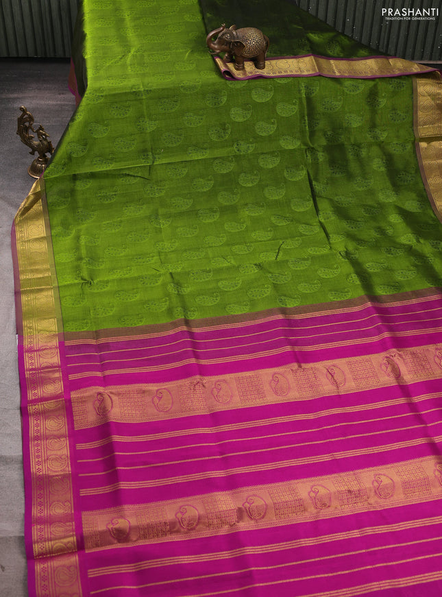 Silk cotton saree mehendi green and magenta pink with allover self emboss jacquard and paisley zari woven border
