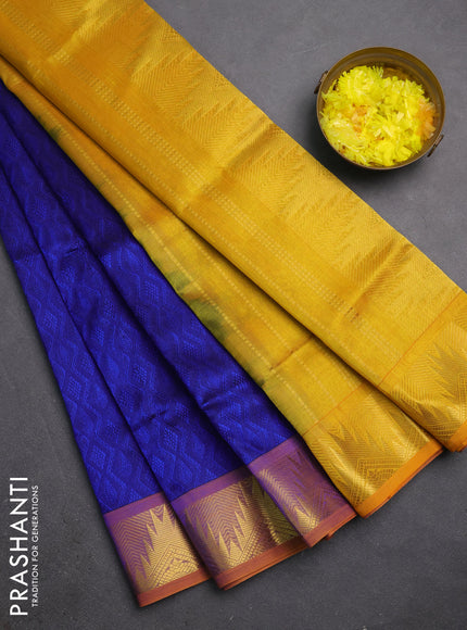 Silk cotton saree blue and mustard yellow with allover self emboss jacquard and temple zari woven border