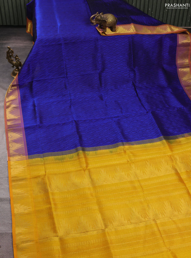 Silk cotton saree blue and mustard yellow with allover self emboss jacquard and temple zari woven border