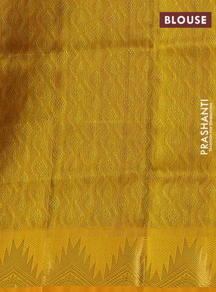 Silk cotton saree blue and mustard yellow with allover self emboss jacquard and temple zari woven border