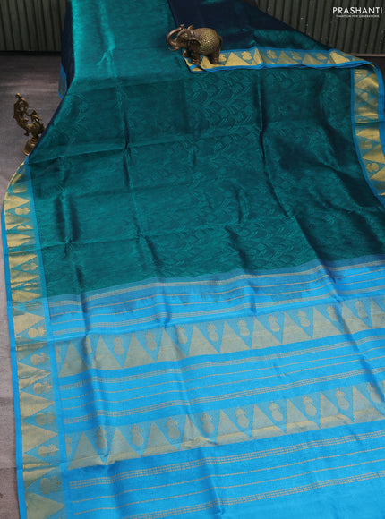 Silk cotton saree peacock green and cs blue with allover self emboss jacquard and zari woven border
