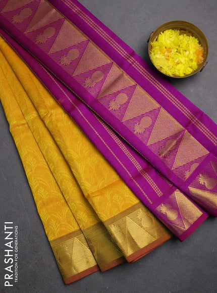 Silk cotton saree mango yellow and purple with allover self emboss jacquard and zari woven border