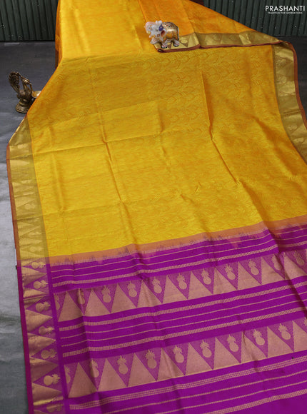 Silk cotton saree mango yellow and purple with allover self emboss jacquard and zari woven border