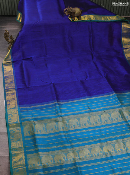 Silk cotton saree blue and dual shade of teal bluish green with allover self emboss jacquard and elephant zari woven border