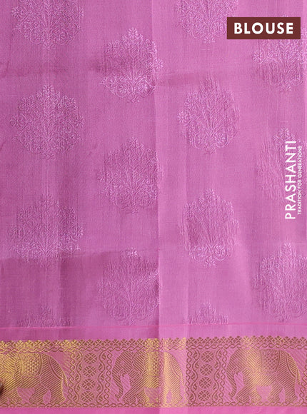 Silk cotton saree dual shade of green and light pink with allover self emboss jacquard and elephant zari woven border