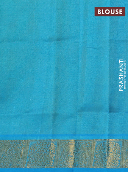Silk cotton saree dual shade of pista green and light blue with allover self emboss jacquard and zari woven border