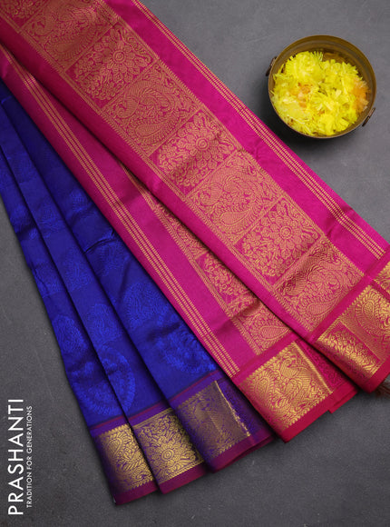 Silk cotton saree blue and magenta pink with allover self emboss jacquard and zari woven border