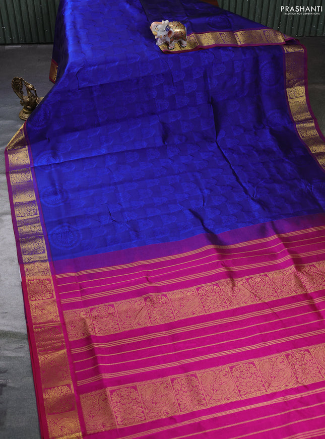 Silk cotton saree blue and magenta pink with allover self emboss jacquard and zari woven border
