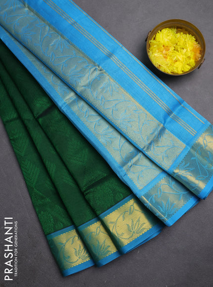 Silk cotton saree green and light blue with allover self emboss jacquard and zari woven border