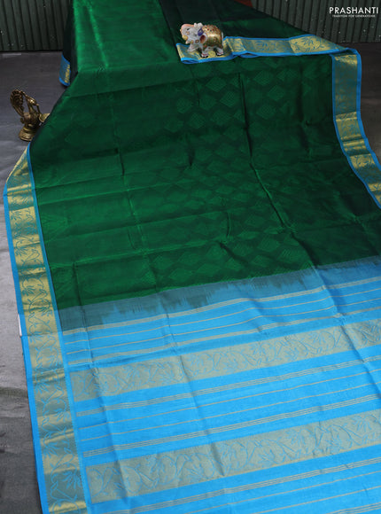 Silk cotton saree green and light blue with allover self emboss jacquard and zari woven border