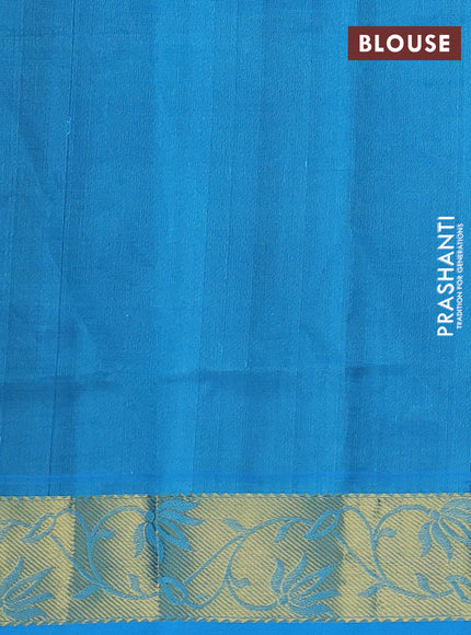 Silk cotton saree green and light blue with allover self emboss jacquard and zari woven border