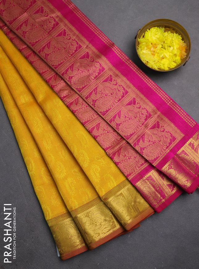 Silk cotton saree mango yellow and magenta pink with allover self emboss jacquard and annam zari woven border