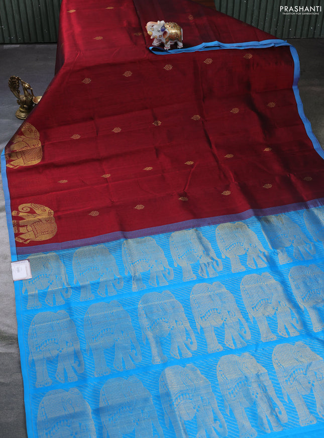 Silk cotton saree maroon and blue with zari woven buttas and elephant zari woven butta border