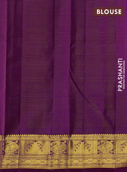 Pure kanchipurams silk saree purple with allover vairaosi pattern & zari buttas and temple & paisley zari woven border