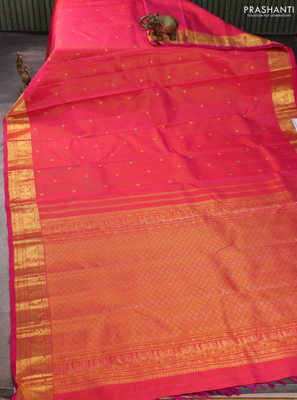 Pure kanchipurams silk saree pink with allover vairaosi pattern & zari buttas and temple & paisley zari woven border
